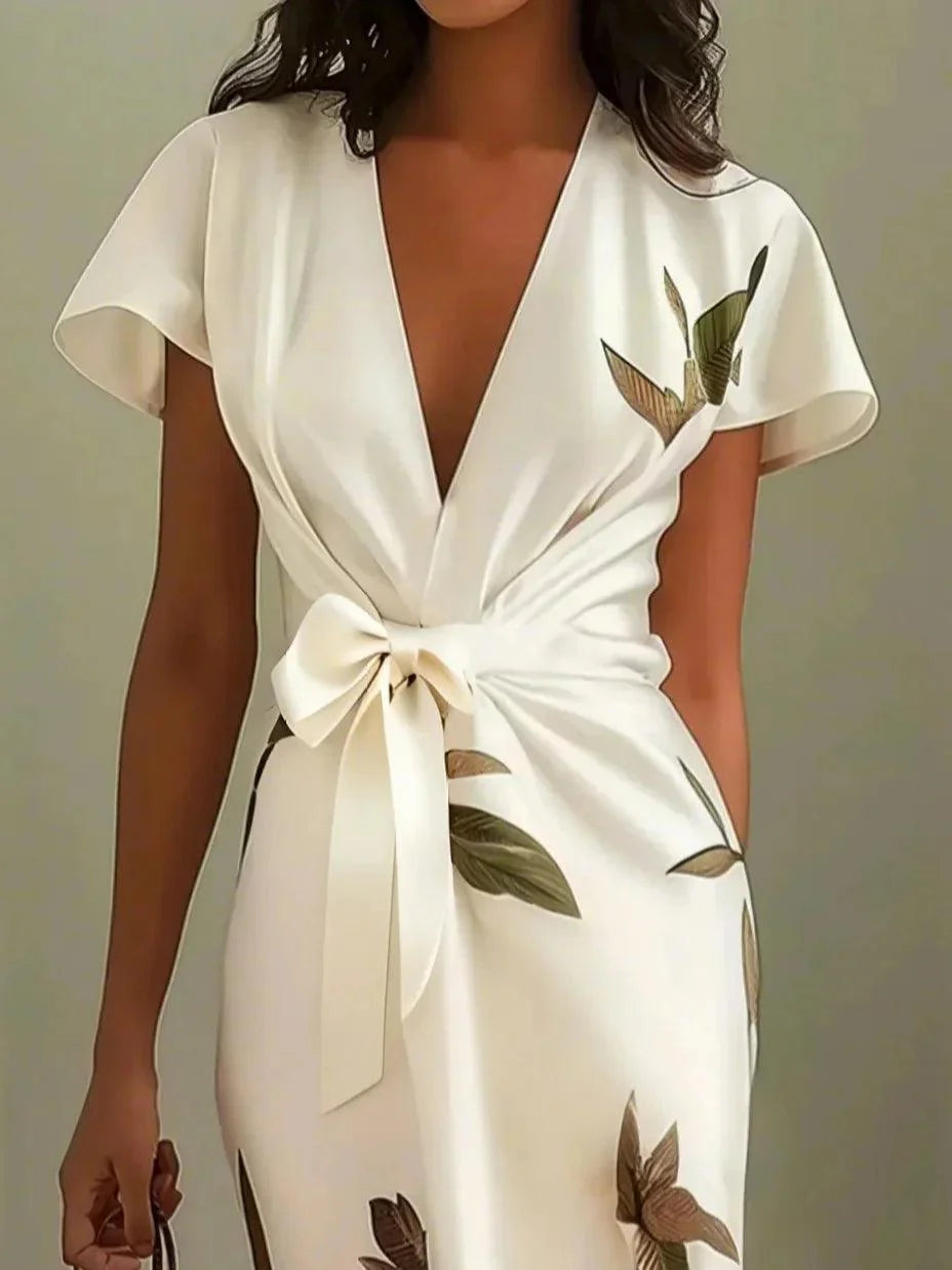 Sanne | Elegant midi dress with short sleeves and a subtle leaf print
